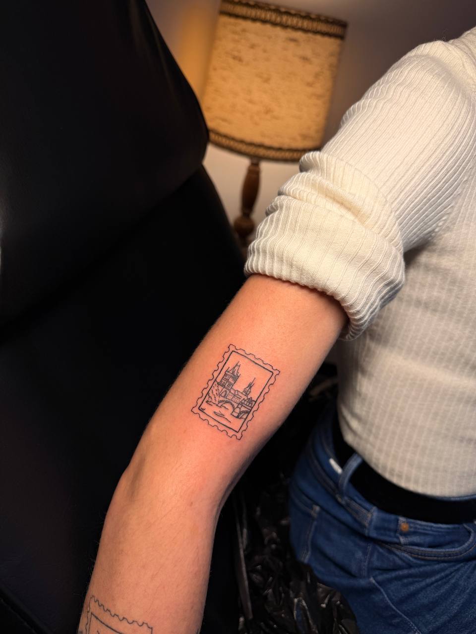 Minimal text tattoo on collarbone — 1+1=11